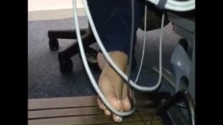Cams4free.net - candid feet in library under desk